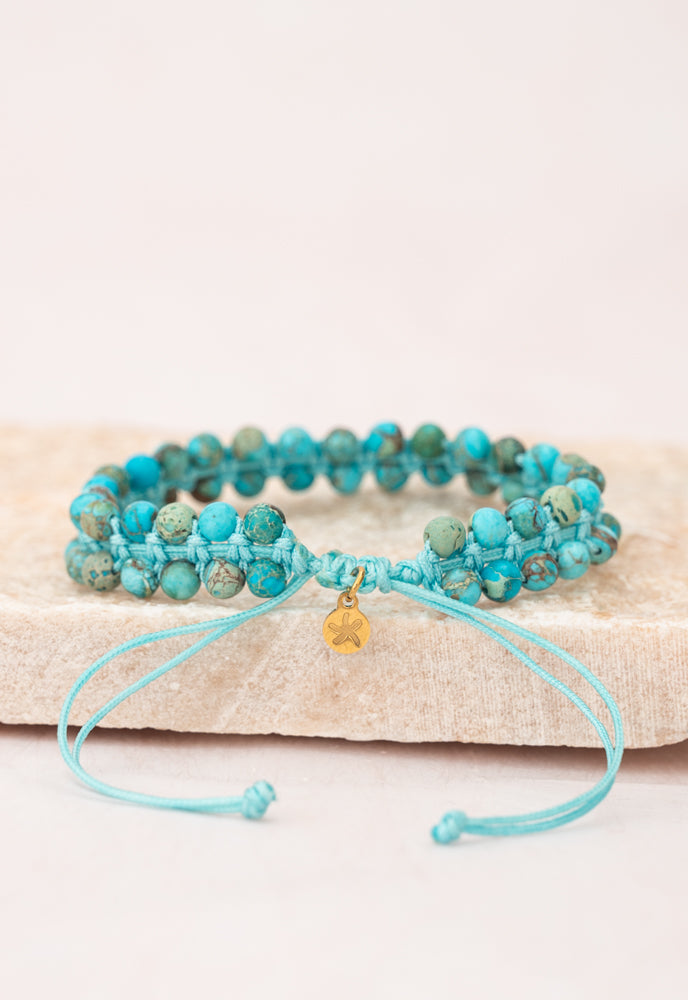 Turquoise Handwoven Beaded Bracelet - Give Freedom to Exploited Women!