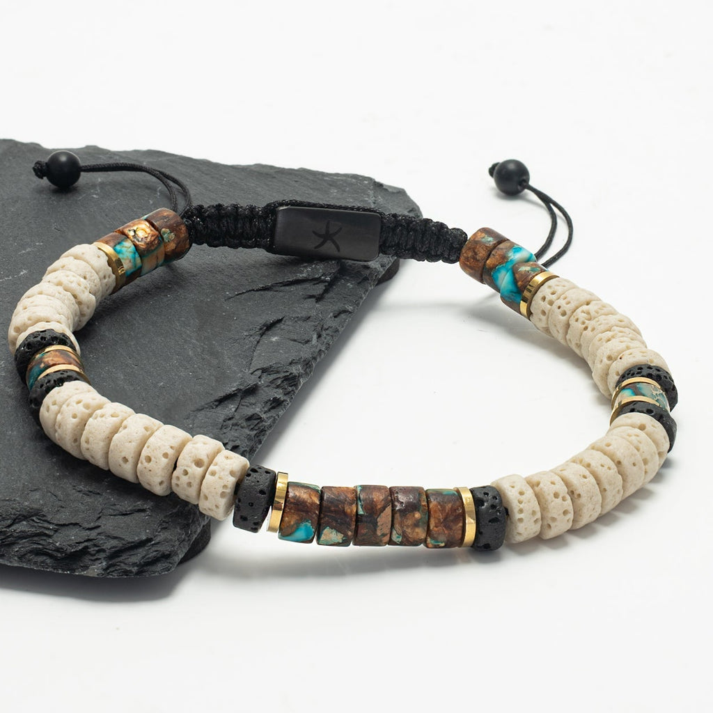 Beaded bracelet with natural stones on a white background