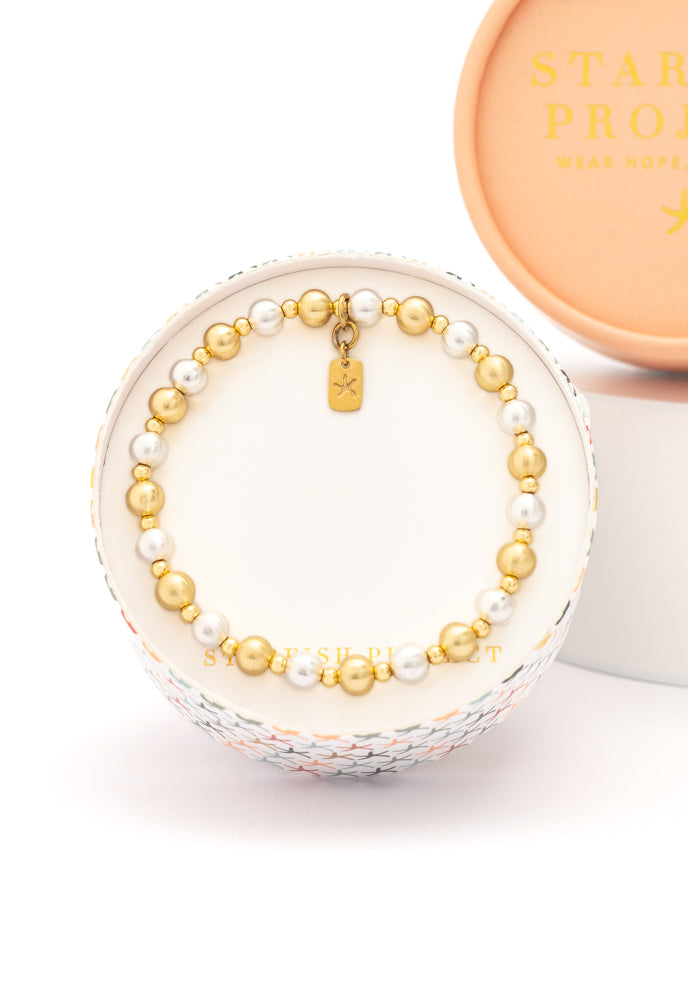 Silver and Gold Beaded Bracelet- Give Exploited Women Freedom!