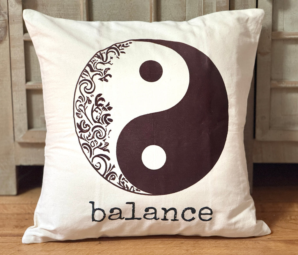 Decorative handmade cotton canvas 20" x 20" decorative pillow with yin yang symbol and the word 'balance'. Handmade by Survivors.