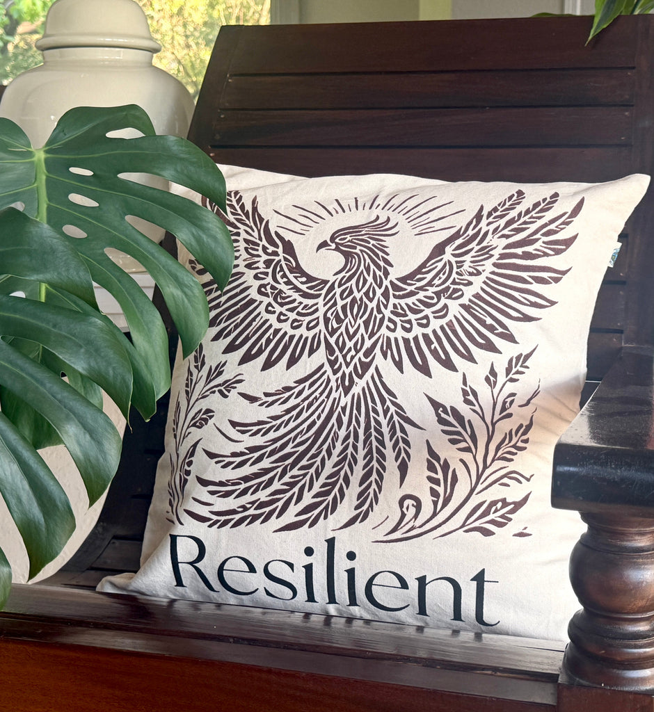 20" x 20" Decorative cotton Canvas pillow with a Rising Phoenix design and the word 'Resilient'. Hand-sewn & Hand-printed by Women Survivors in Kolkata, India. 