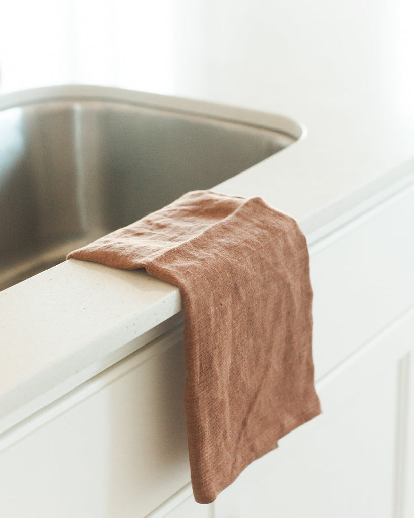 terracotta linen tea towel over sink, bath hand towels, bathroom hand towels, hand towels for bathroom, linen tea towels wholesale, pretty bathroom hand towels