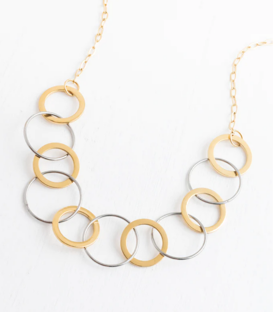 Silver and Gold Circle Necklace- Give freedom & create careers for exploited women!